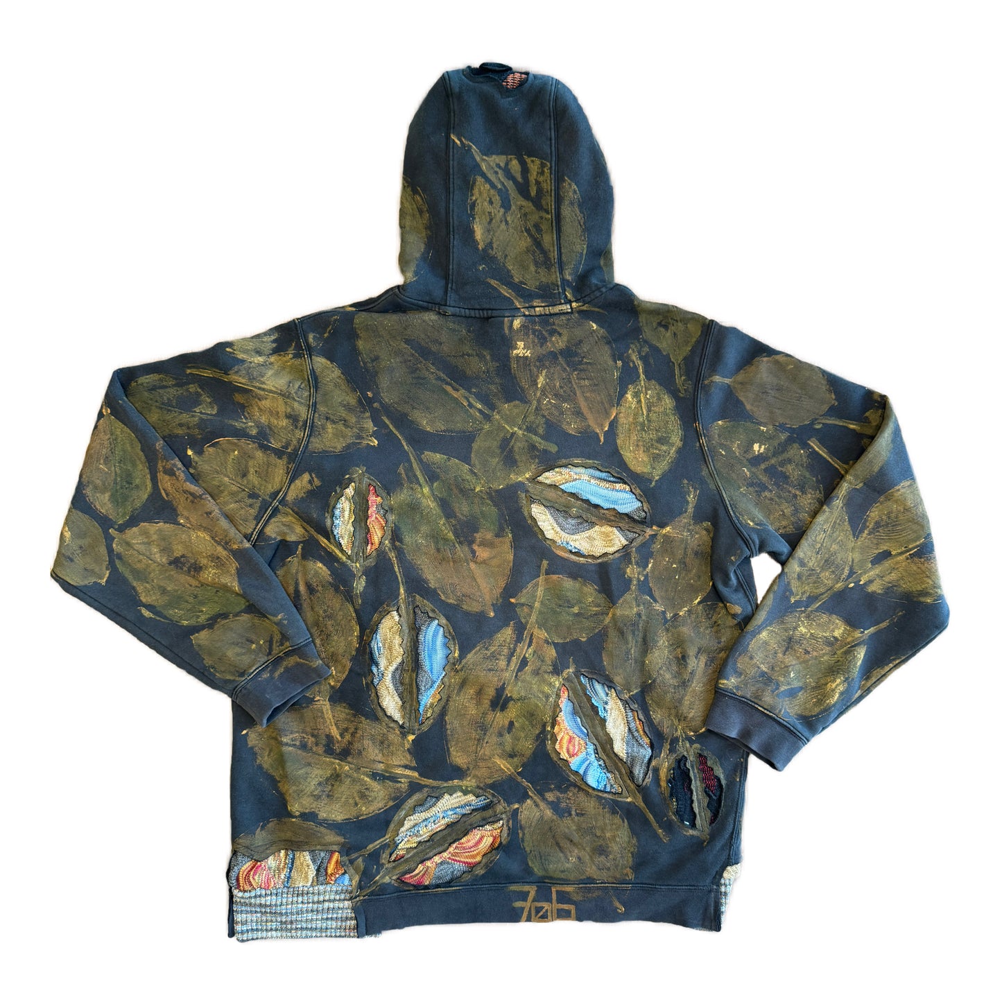 upcycled hoodie with painted leaves